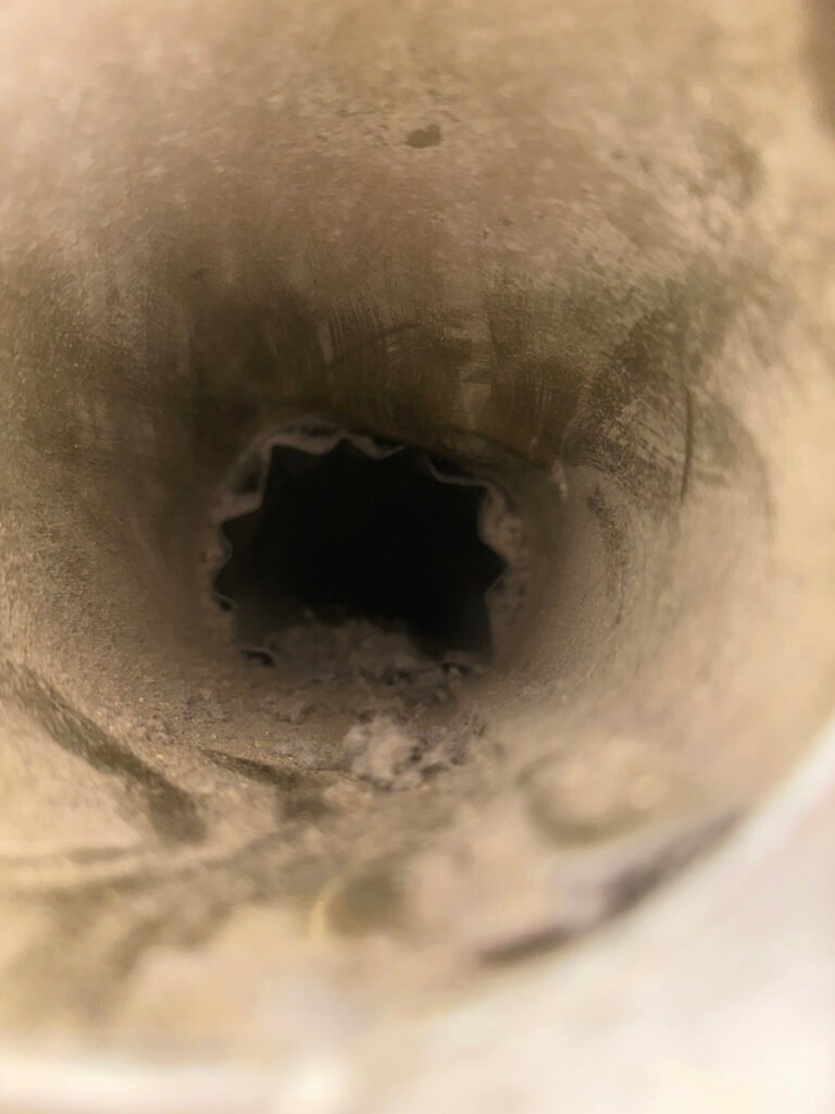 Before dryer vent cleaning.